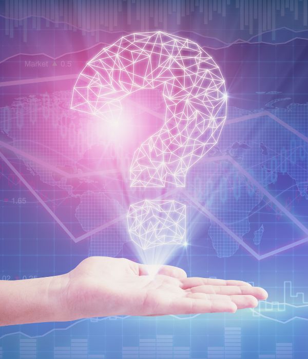 Person looking at laptop, representing FAQs